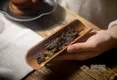 黑砖茶有什么历史发展?原料等级是什么?