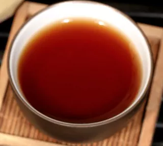 分享中茶厚德熟餅開(kāi)湯