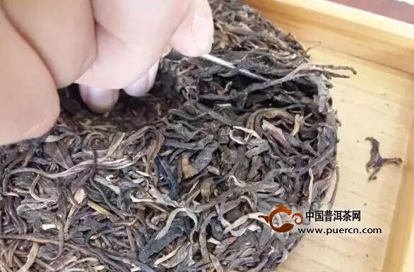 怎样将普洱茶茶饼打碎?