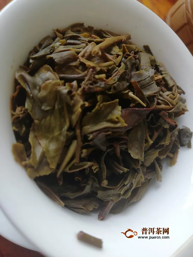茶底有活性，持久耐泡：2014年下关沱茶绿盒甲级沱茶
